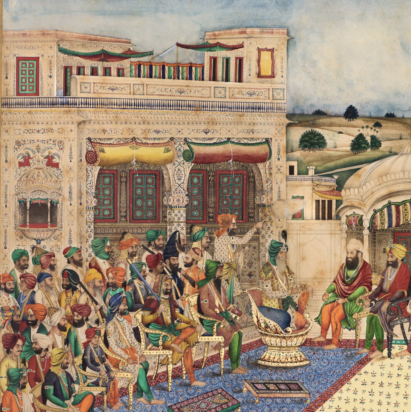 A Sikh court scene — finely detailed painting of a darbar gathering on a blue carpet before an ornate facade